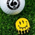 5 Golf Ball Markers That Are Way Too Extra