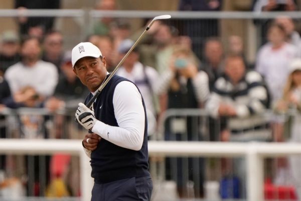 Tiger struggles in wind, fades off Open pace