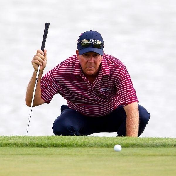 Day, with new clubs, shares Senior British lead