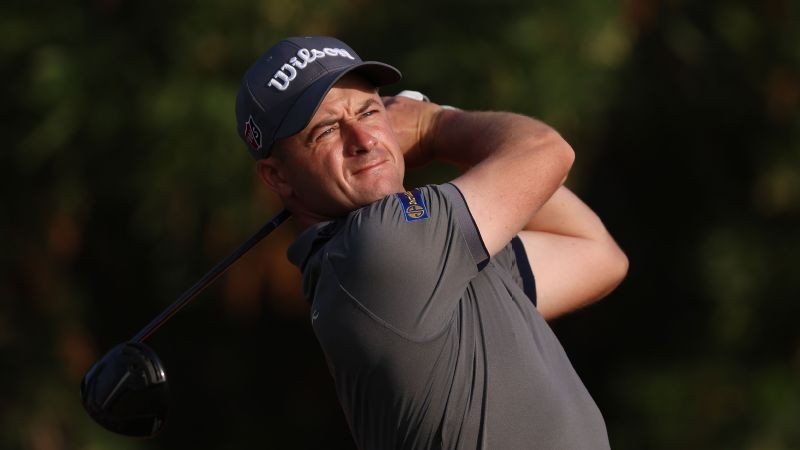 Law takes share of golf lead in UAE day two