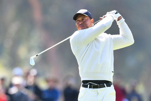 Tiger deals with back spasms, cards 72 in return