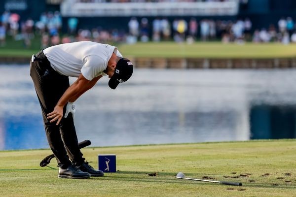 Clark's gaffe helps Schauffele seize Players lead