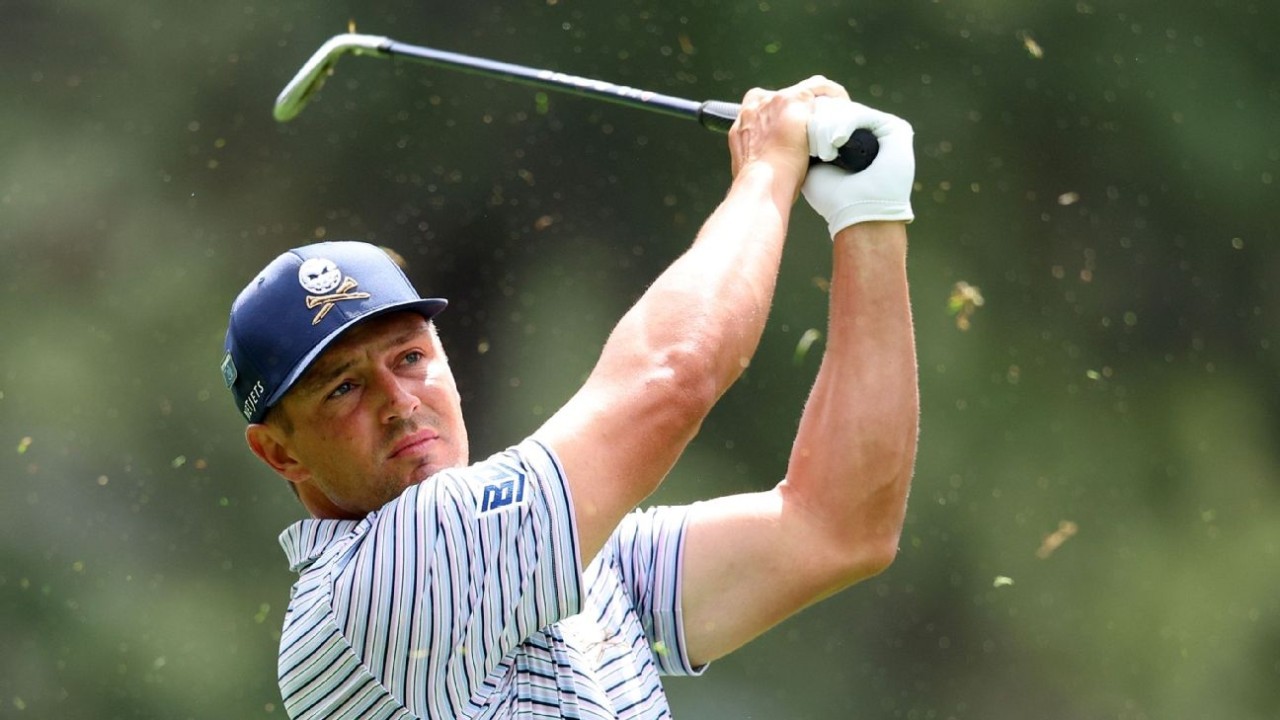 DeChambeau sizzles, leads Scheffler at Masters