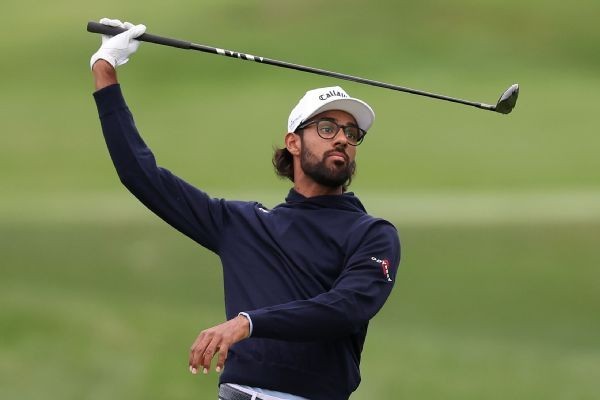 Bhatia shares lead in Detroit; Russell misses cut